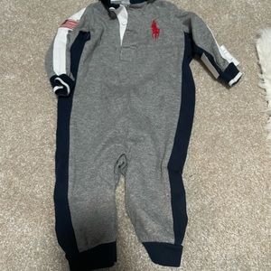 Bundle of boys one pieces and sleepers.